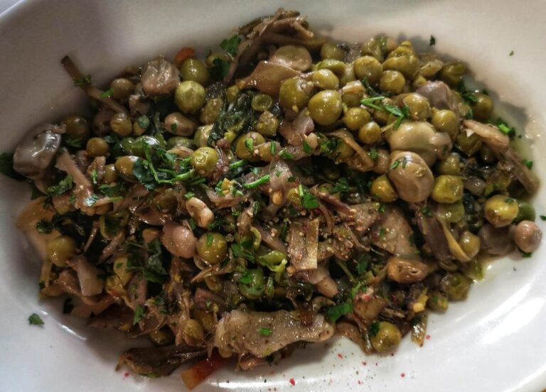 Plate of the traditional spring Lazio dish of vignarola in Cantina Simonetti in the Town of Marino in Castelli Romani region Italy