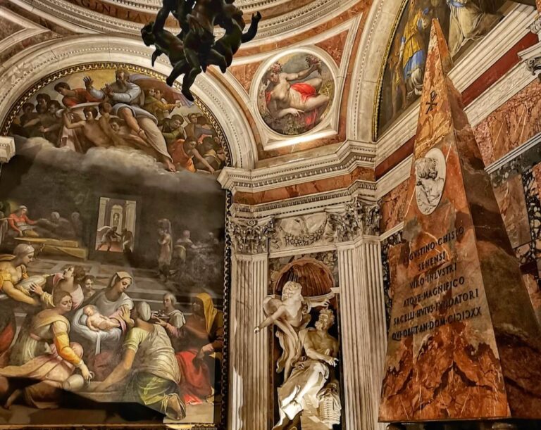View of the Chigi Chapel in Santa Maria del Popolo Rome showing coloured marbles and paintings