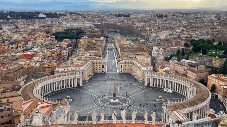 View from the dome of St Peter's Basilica looking down onto Piazza San Pietro and Bernini's grand Colonnade