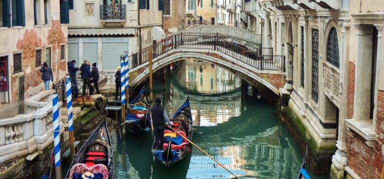 take a gondola ride on a venice canal